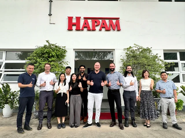 GFF Power and HAPAM team members outside the HAPAM Vietnam facility